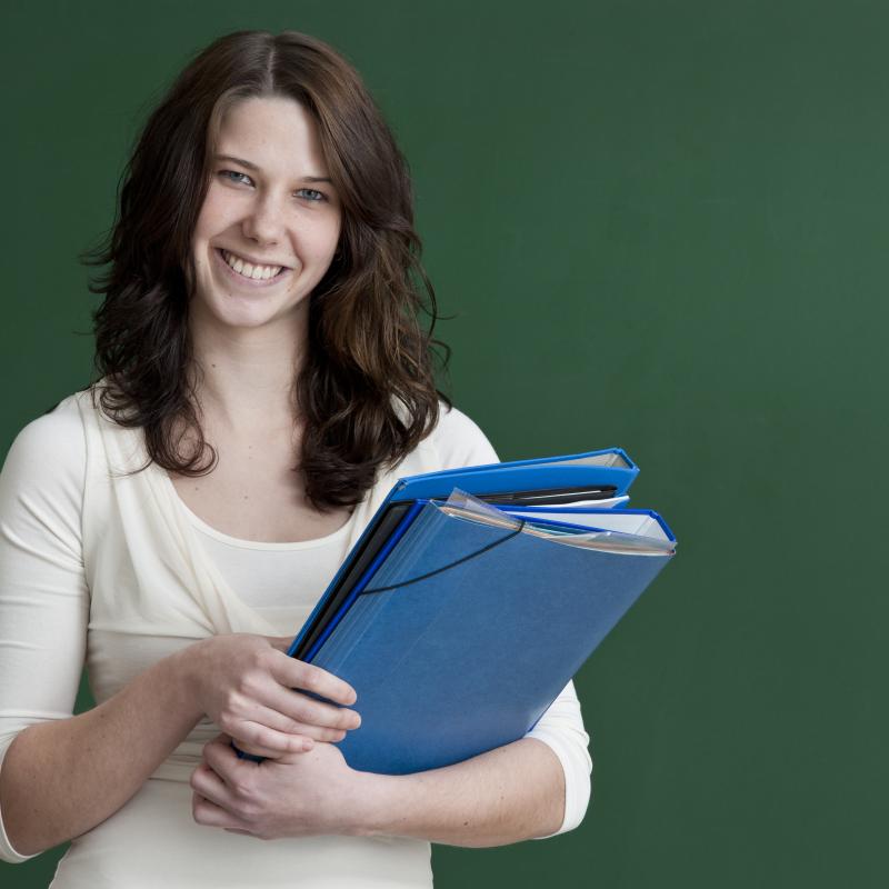 Teacher holding books